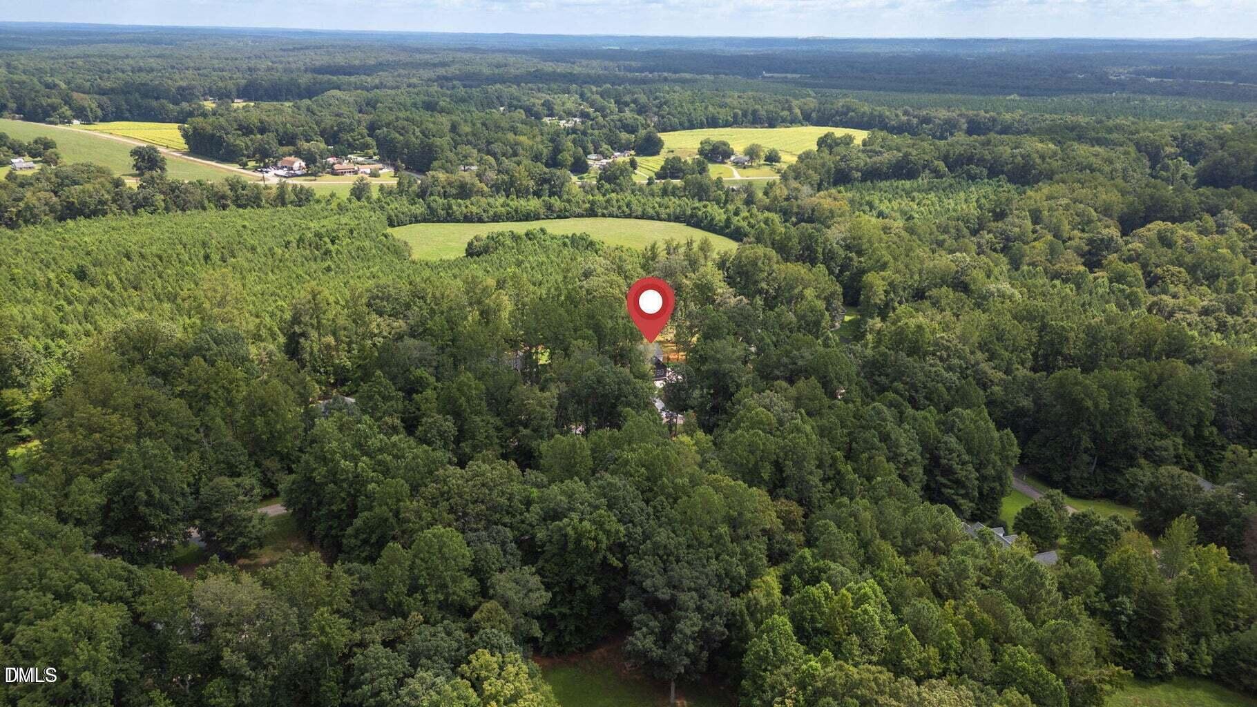 712 Oaks Lane Road Timberlake, NC 27583 - Photo 44 of 49 an aerial view of residential houses with outdoor space and trees