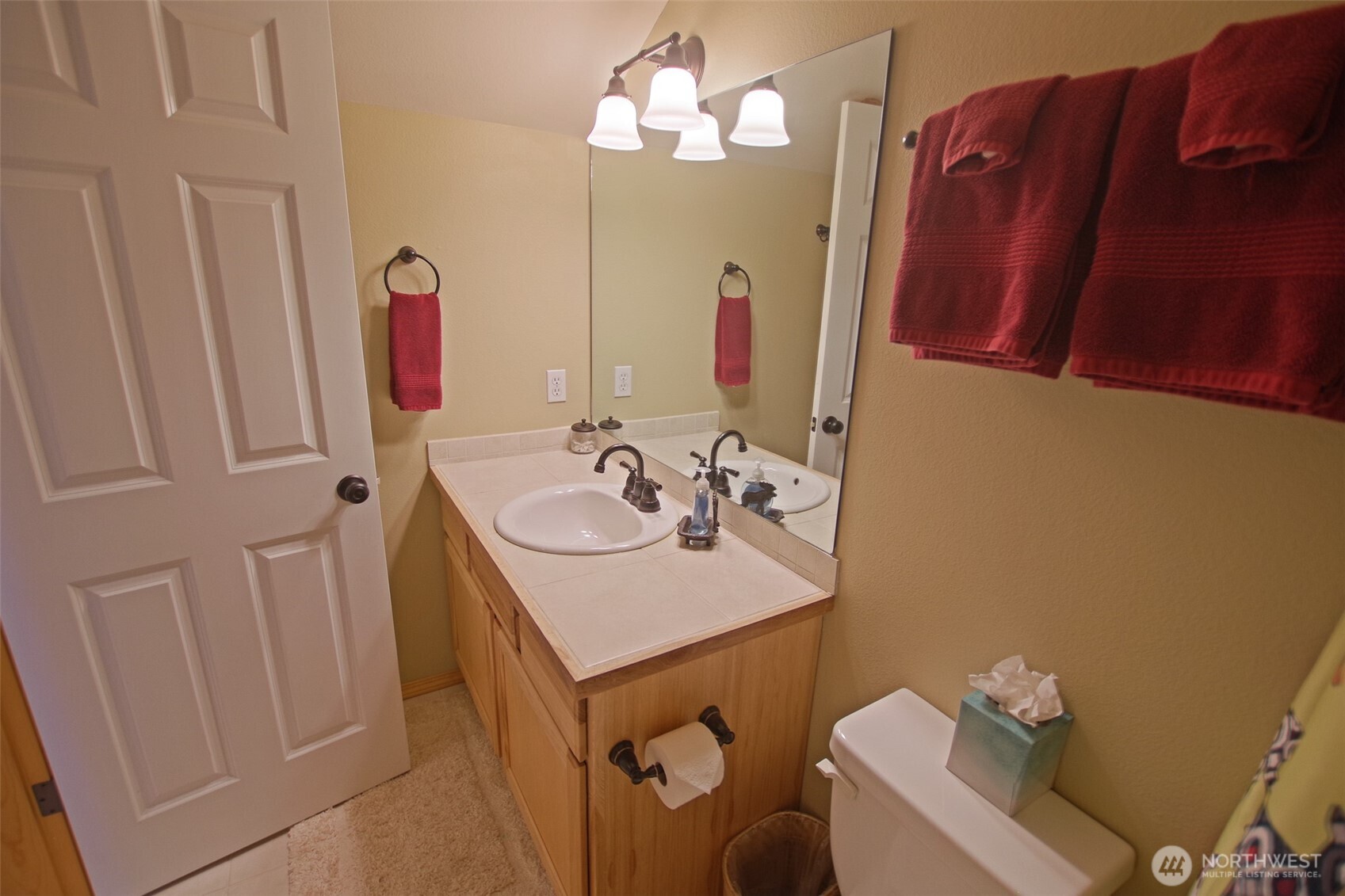 140 Evergreen Valley Loop Road Ronald, WA 98940 - Photo 29 of 37 a bathroom with a sink vanity mirror and toilet