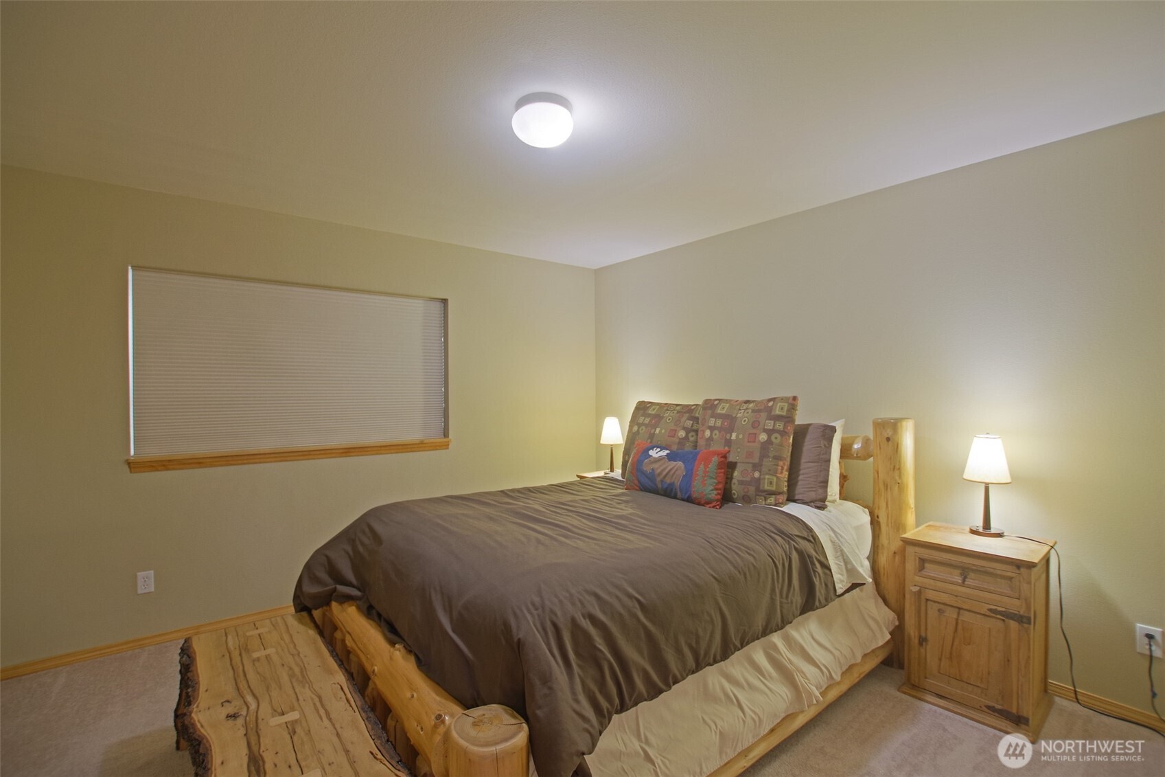 140 Evergreen Valley Loop Road Ronald, WA 98940 - Photo 30 of 37 a bedroom with a bed and window