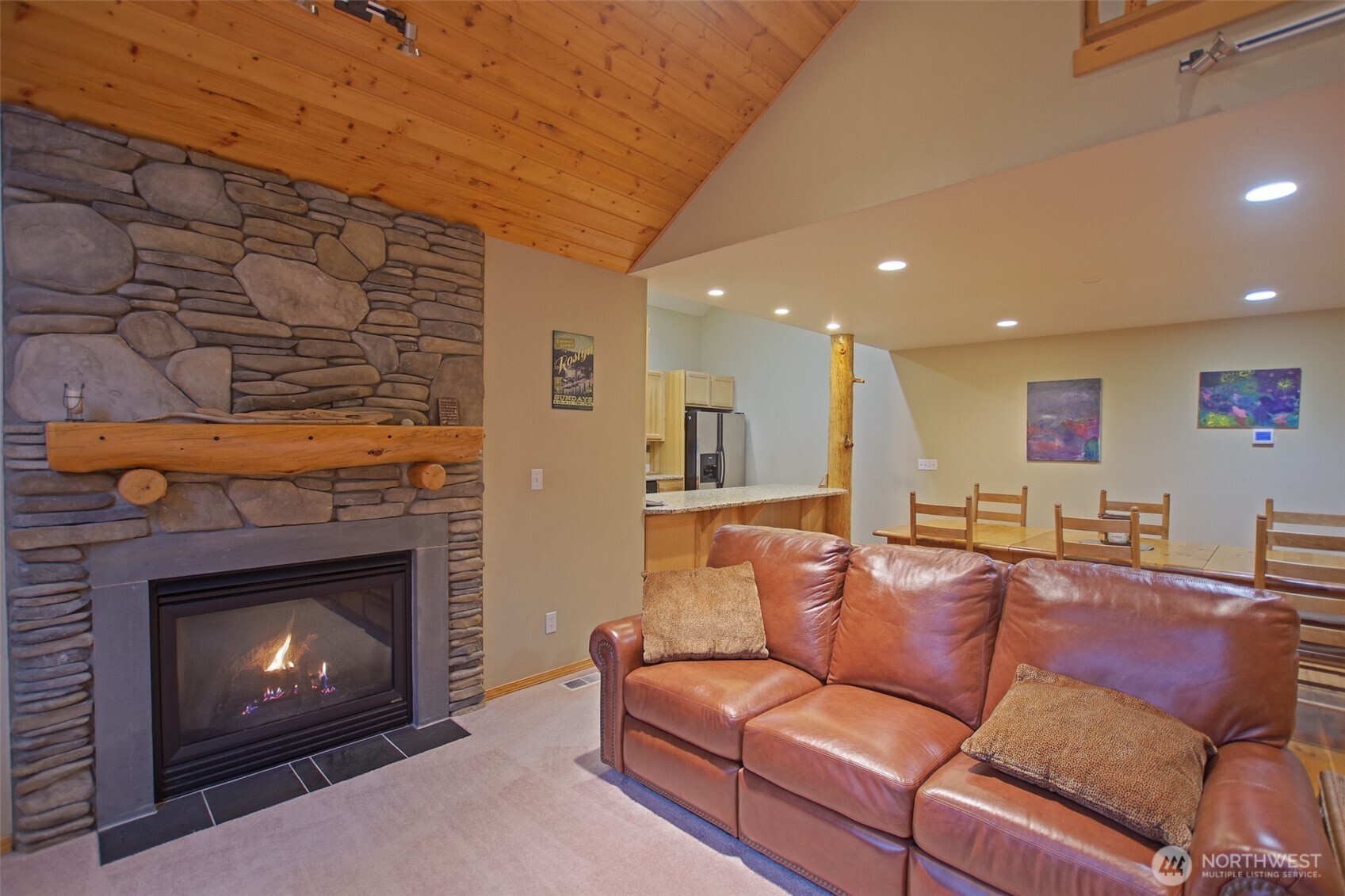 140 Evergreen Valley Loop Road Ronald, WA 98940 - Photo 10 of 37 a living room with furniture and a fireplace