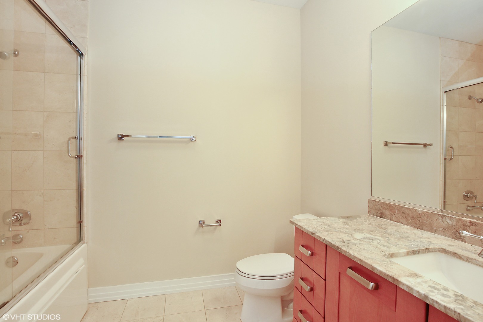 170 West Polk Street, Unit 904 Chicago, IL 60605 - Photo 9 of 10 a bathroom with a granite countertop sink toilet and shower