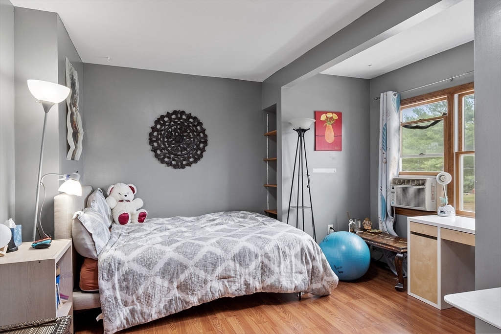 1 Whittier Road Billerica, MA 01821 - Photo 17 of 29 a bedroom with a bed and a large window
