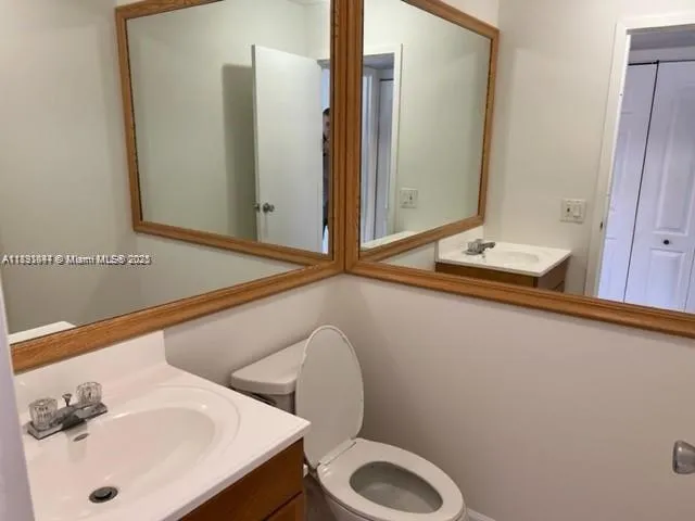 a bathroom with a sink and a toilet