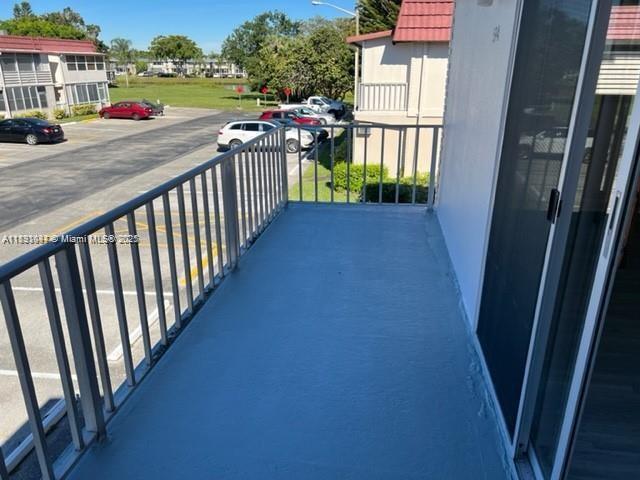 594 Saxony M, Unit 594 Delray Beach, FL 33446 - Photo 9 of 9 a view of a street from a balcony