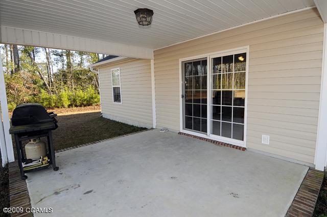 115 Manchester Road Havelock, NC 28532 - Photo 13 of 13 COVERED REAR PORCH