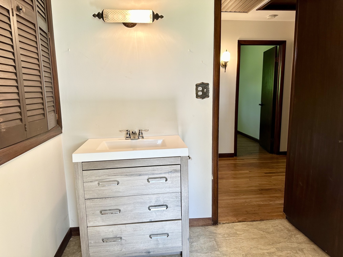 1453 North 2401st Road Ottawa, IL 61350 - Photo 19 of 26 a bathroom with a sink a mirror and shower