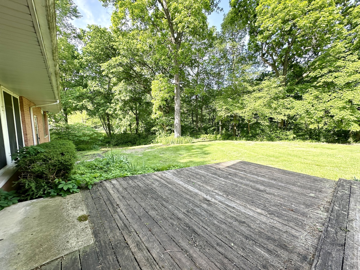 1453 North 2401st Road Ottawa, IL 61350 - Photo 24 of 26 a view of a swimming pool with an outdoor space and seating area