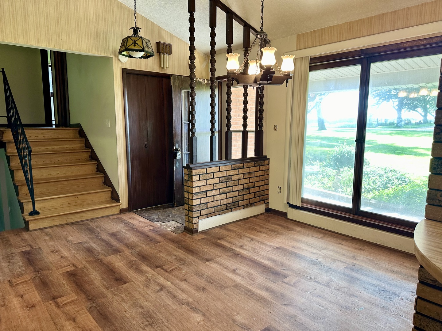 1453 North 2401st Road Ottawa, IL 61350 - Photo 4 of 26 a view of hallway with stairs and wooden floor