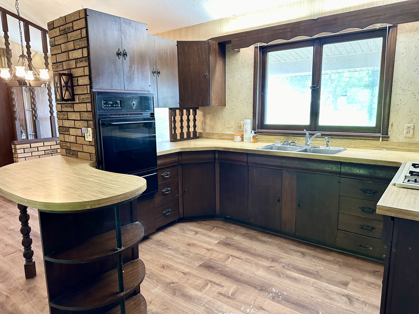 1453 North 2401st Road Ottawa, IL 61350 - Photo 5 of 26 a kitchen with a sink cabinets and wooden floor