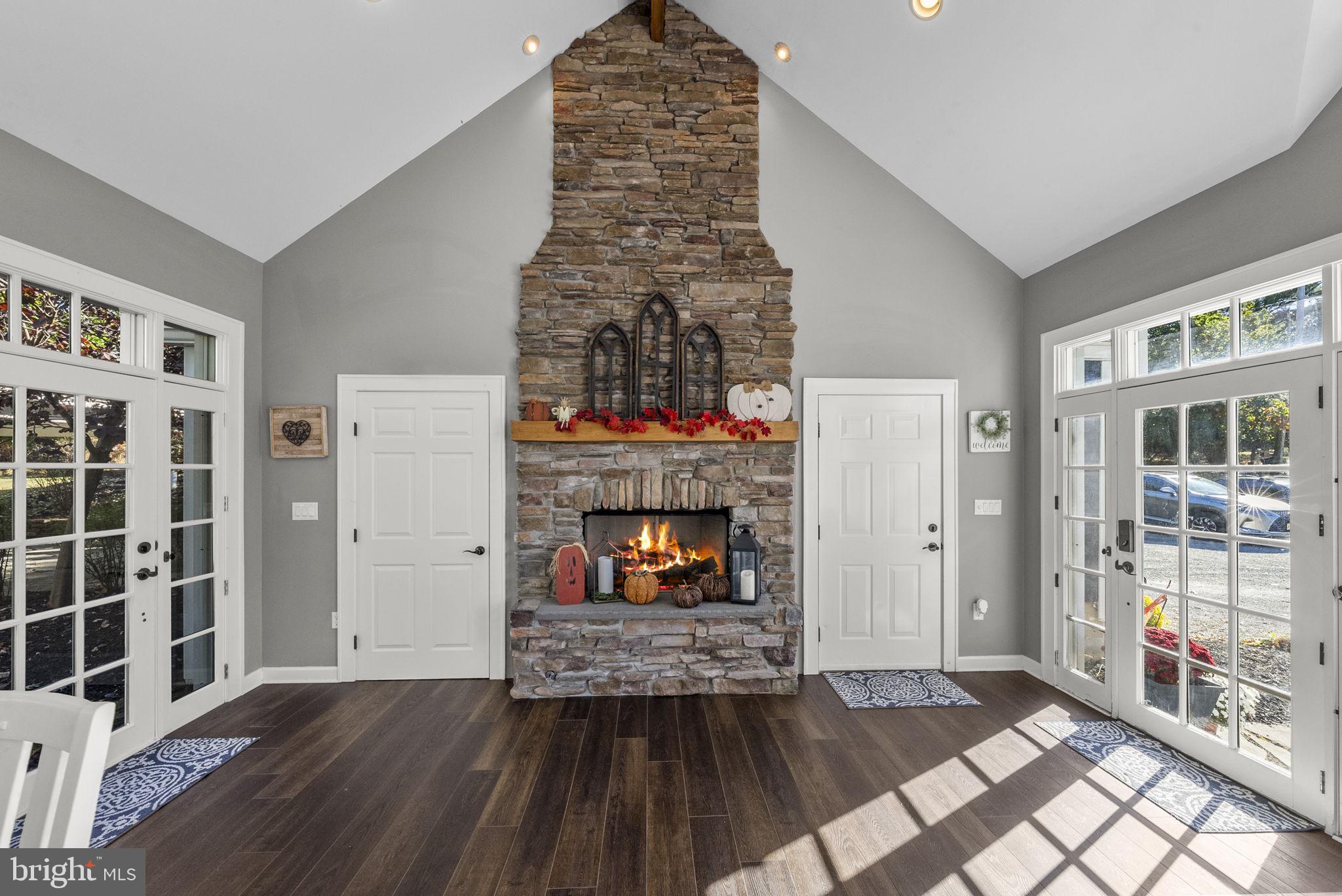 623 Montgomery Road Hillsborough, NJ 08844 - Photo 11 of 67 an empty room with windows and fireplace