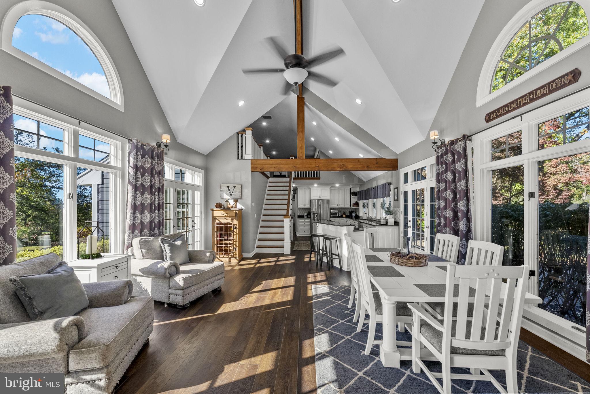 623 Montgomery Road Hillsborough, NJ 08844 - Photo 15 of 67 a dining room with furniture a floor to ceiling window and outdoor view