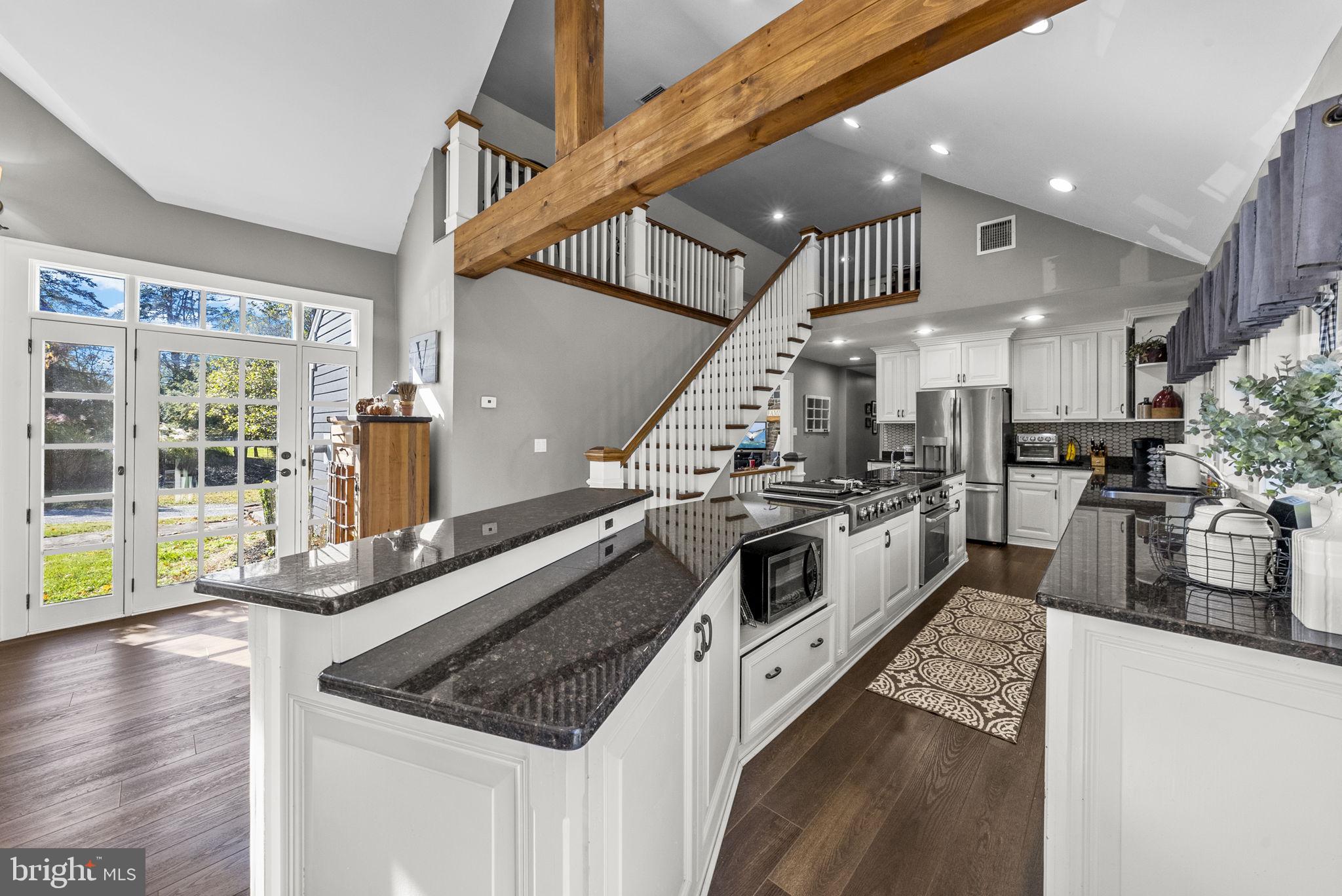 623 Montgomery Road Hillsborough, NJ 08844 - Photo 19 of 67 a large white kitchen with lots of counter top space