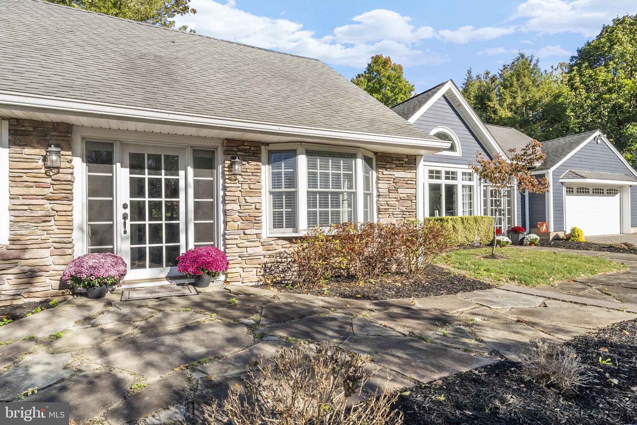 623 Montgomery Road Hillsborough, NJ 08844 - Photo 2 of 67 a front view of a house with a yard