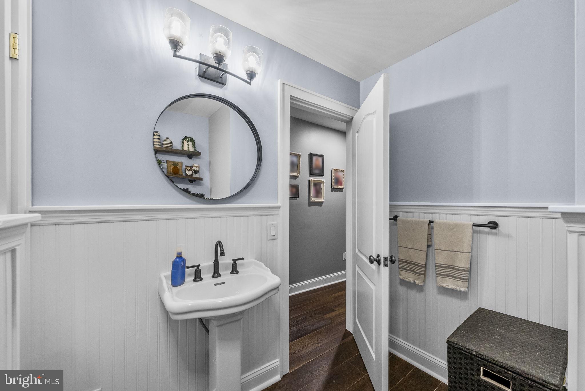 623 Montgomery Road Hillsborough, NJ 08844 - Photo 22 of 67 a bathroom with a sink mirror and a window