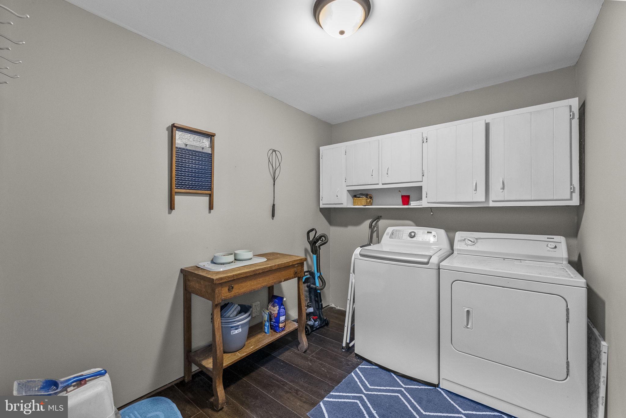 623 Montgomery Road Hillsborough, NJ 08844 - Photo 23 of 67 a utility room with dryer and washer