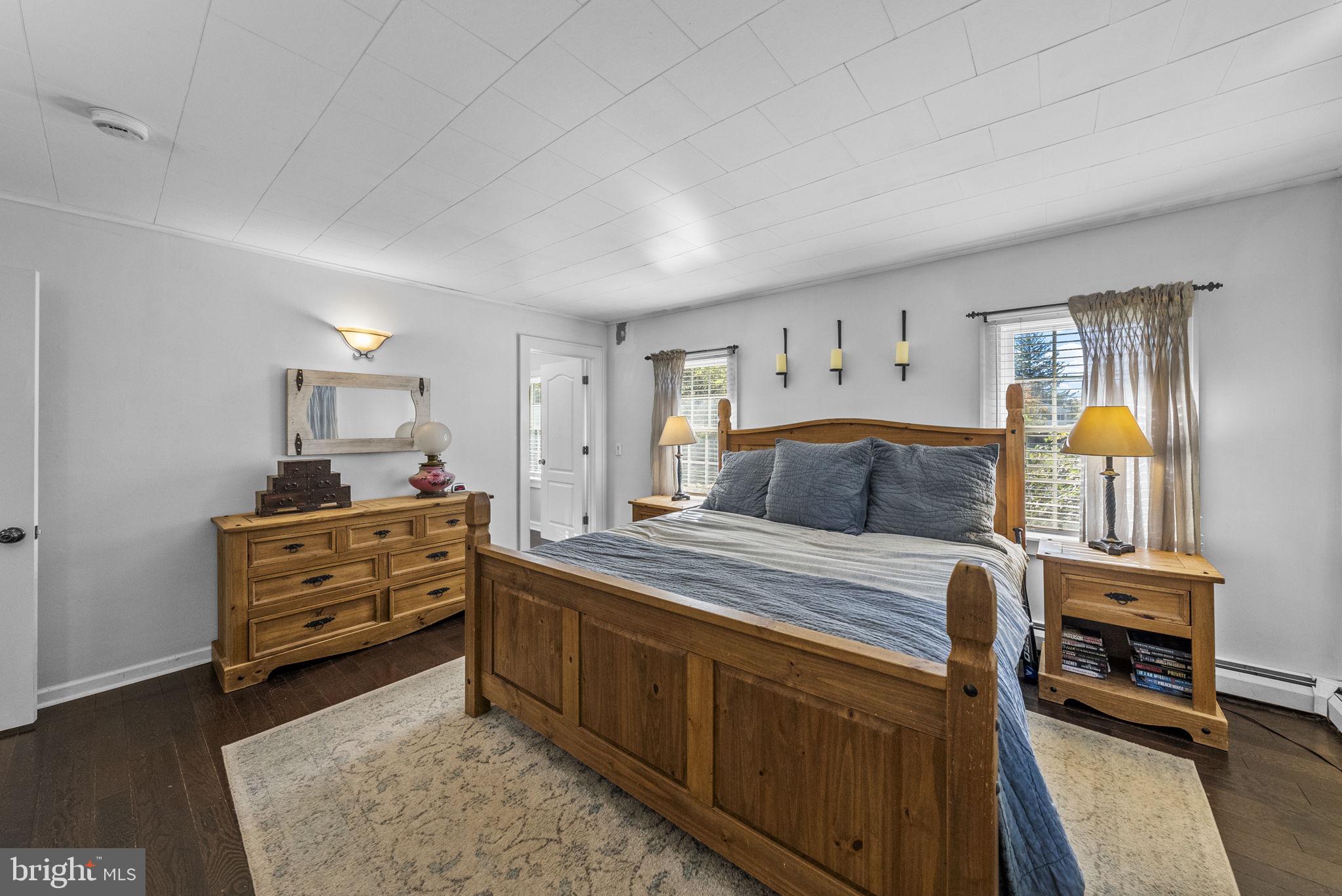 623 Montgomery Road Hillsborough, NJ 08844 - Photo 24 of 67 a bedroom with a bed and a dresser in it