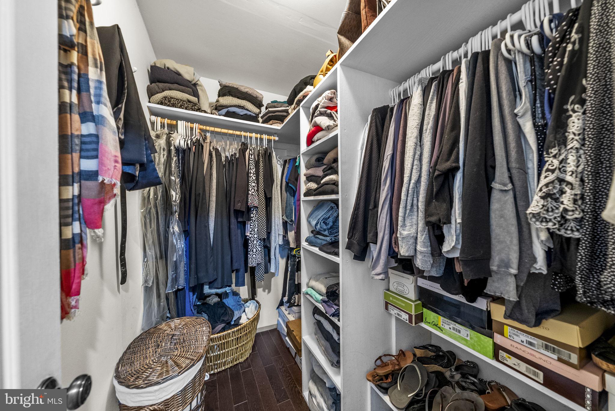 623 Montgomery Road Hillsborough, NJ 08844 - Photo 29 of 67 a view of walk in closet with clothes and shoes