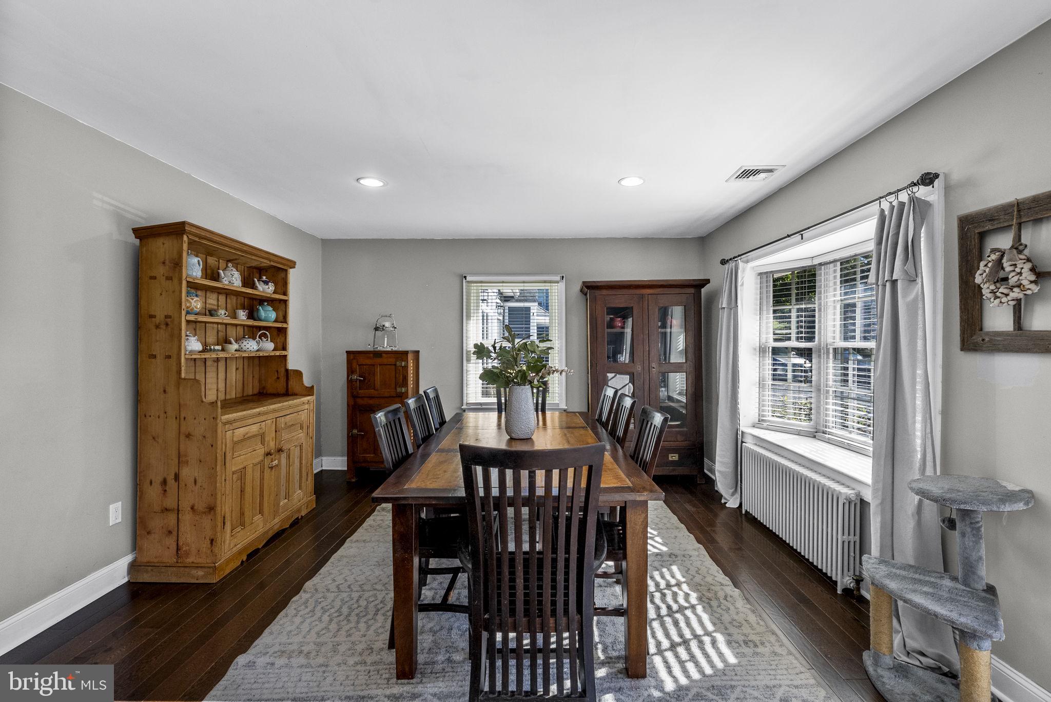 623 Montgomery Road Hillsborough, NJ 08844 - Photo 36 of 67 a view of a dining room with furniture window and wooden floor