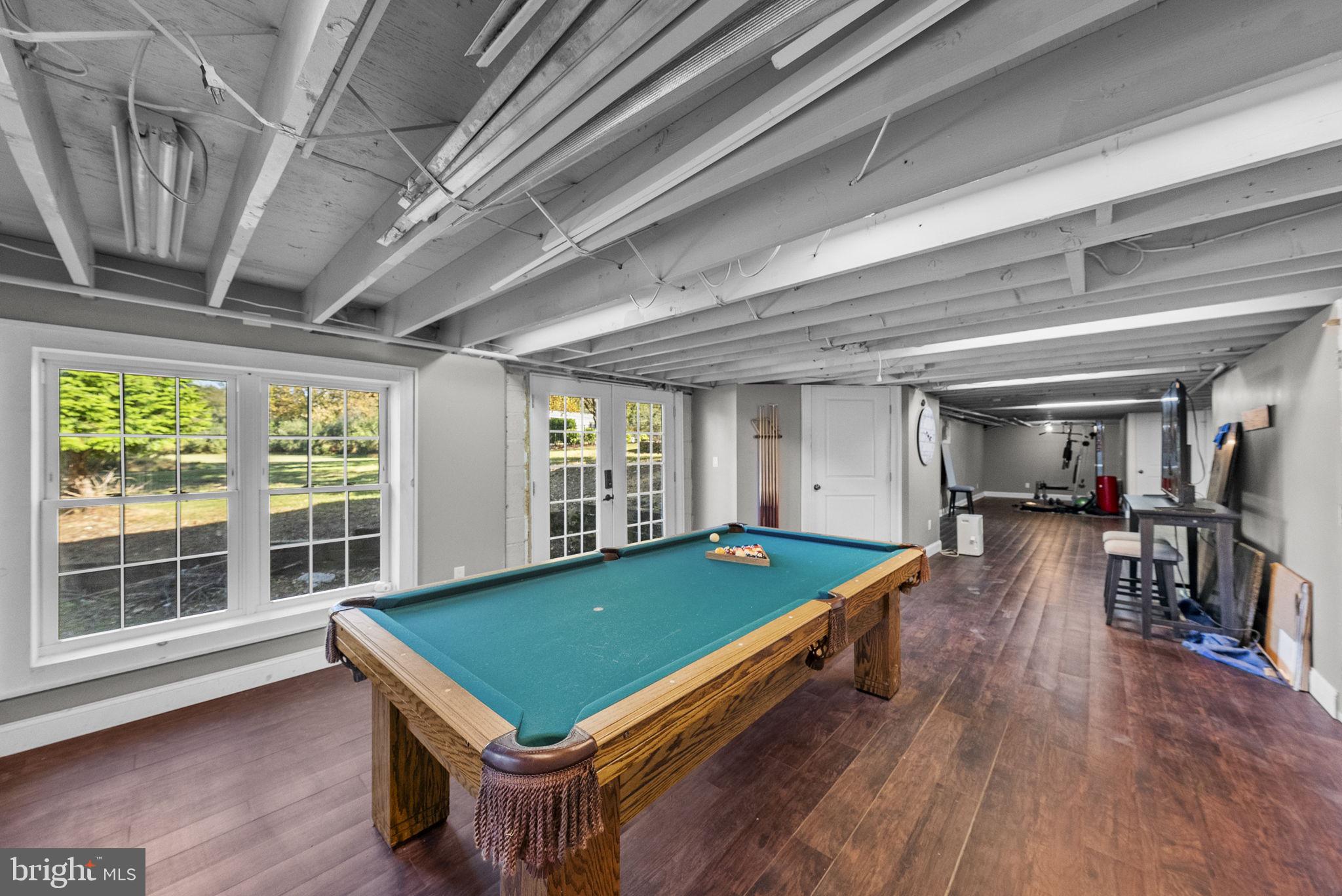 623 Montgomery Road Hillsborough, NJ 08844 - Photo 45 of 67 a room with pool table and windows