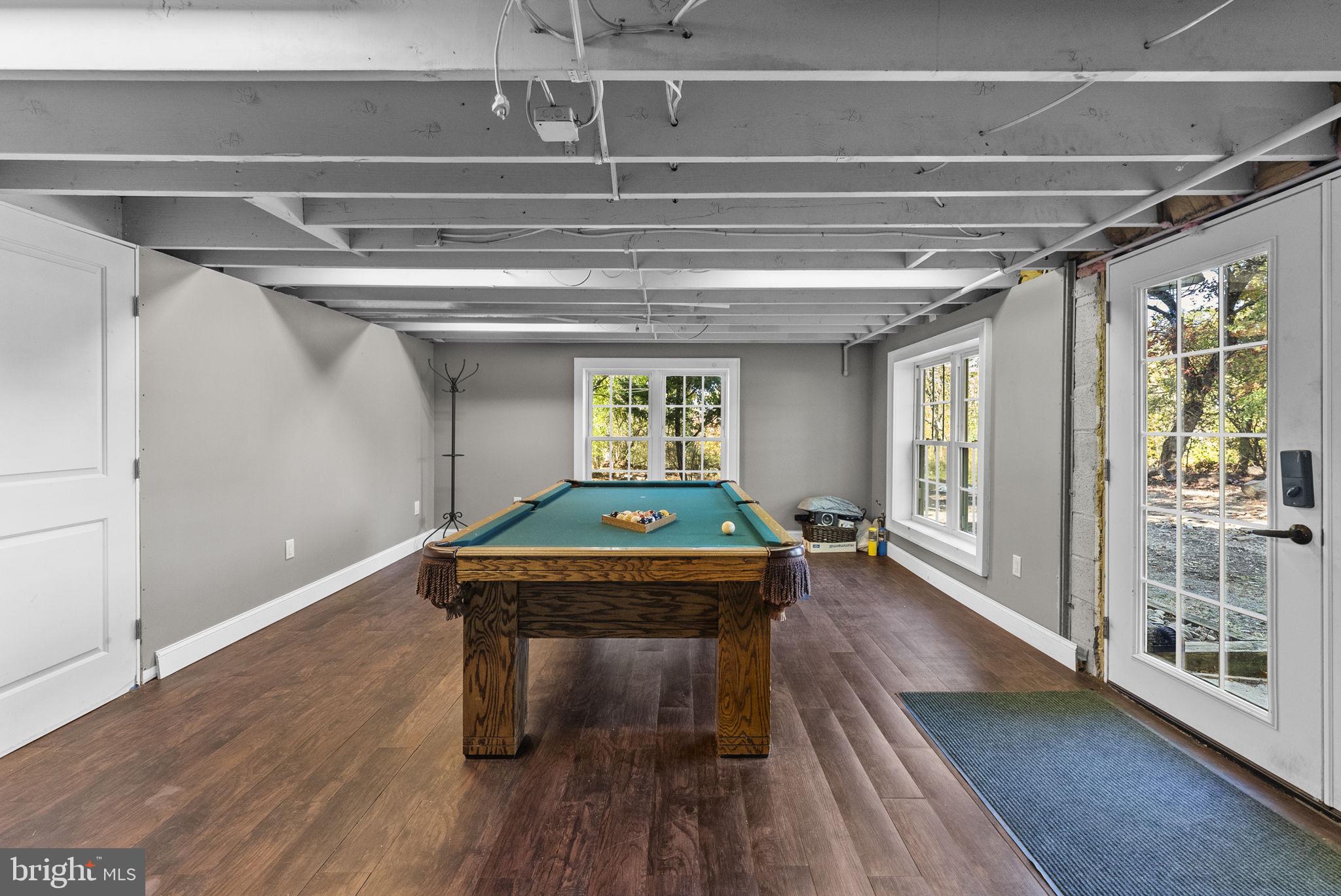 623 Montgomery Road Hillsborough, NJ 08844 - Photo 46 of 67 a room with furniture and wooden floor