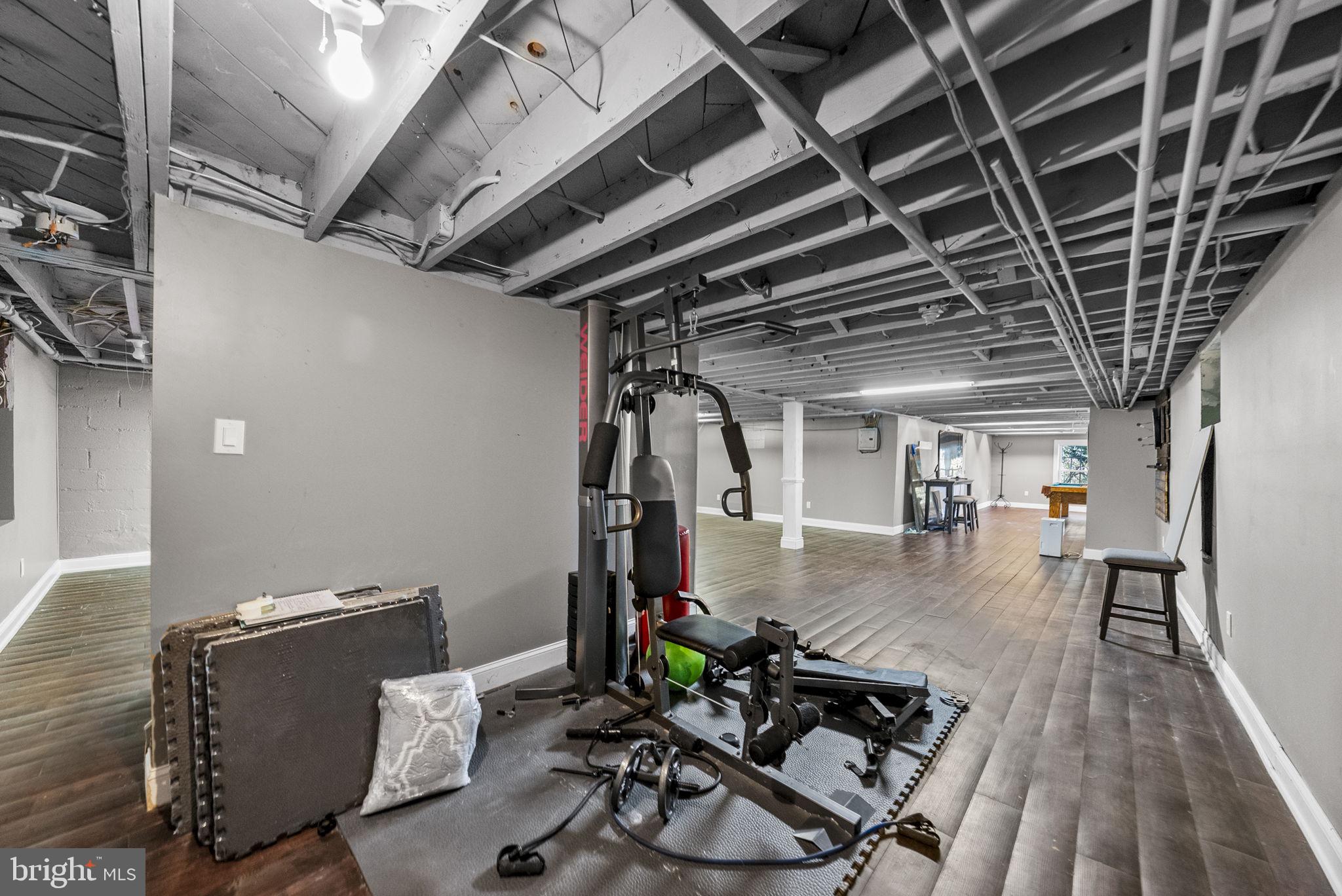 623 Montgomery Road Hillsborough, NJ 08844 - Photo 48 of 67 a view of a dining room with furniture wooden floor and a chandelier