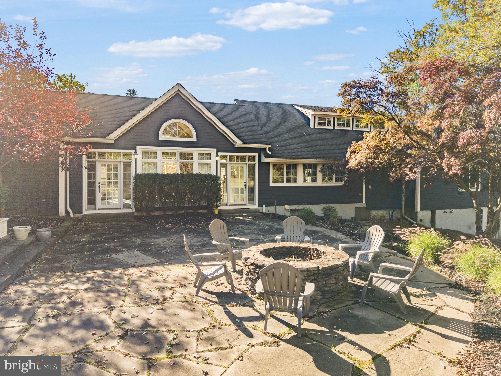 623 Montgomery Road Hillsborough, NJ 08844 - Photo 50 of 67 a front view of a house with garden