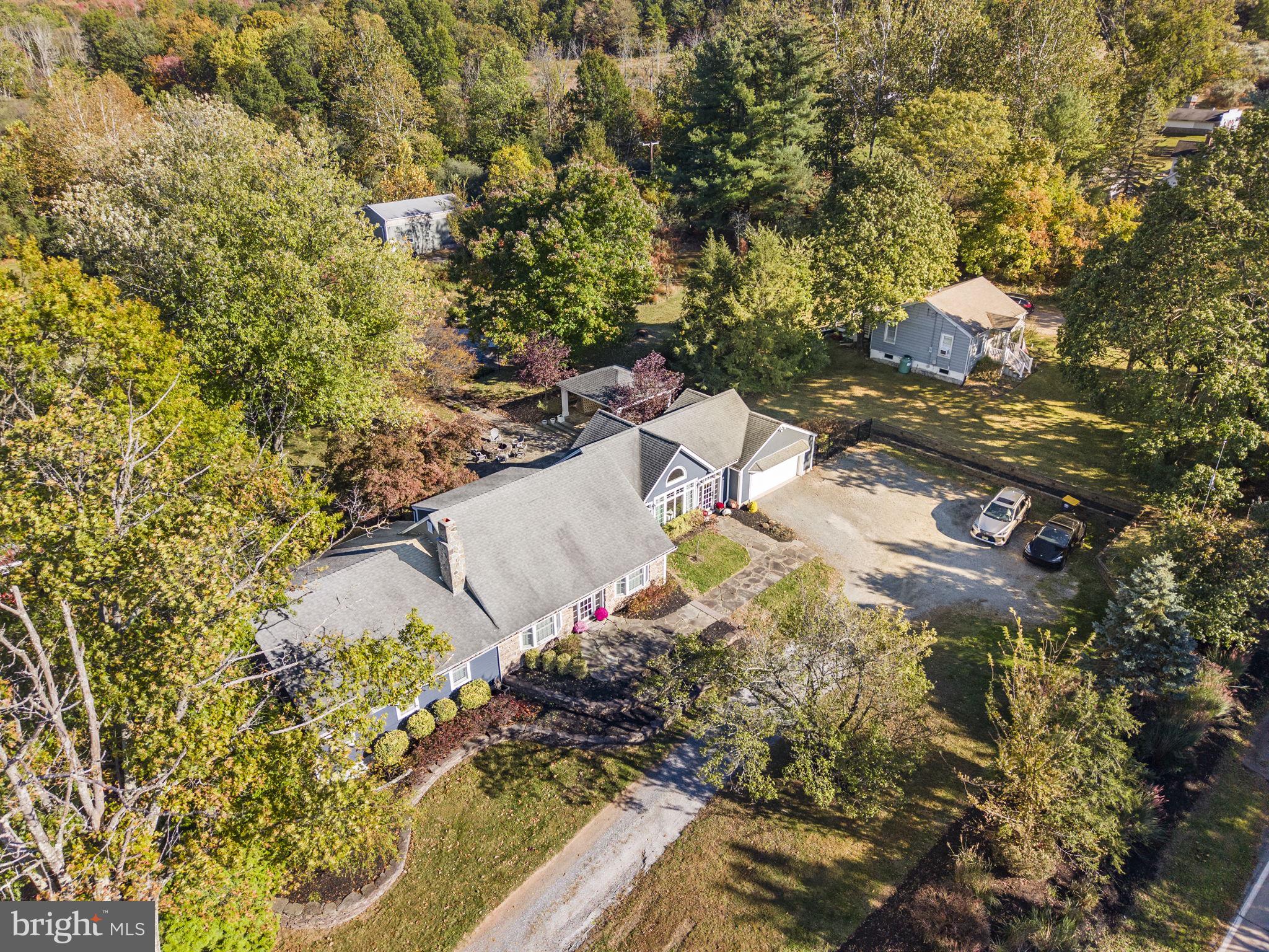 623 Montgomery Road Hillsborough, NJ 08844 - Photo 5 of 67 a view of a tree with a yard