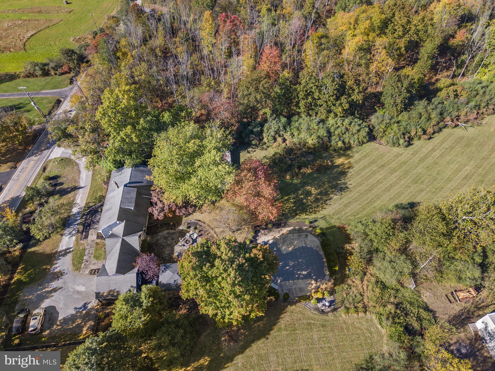 623 Montgomery Road Hillsborough, NJ 08844 - Photo 63 of 67 an aerial view of a house with a yard