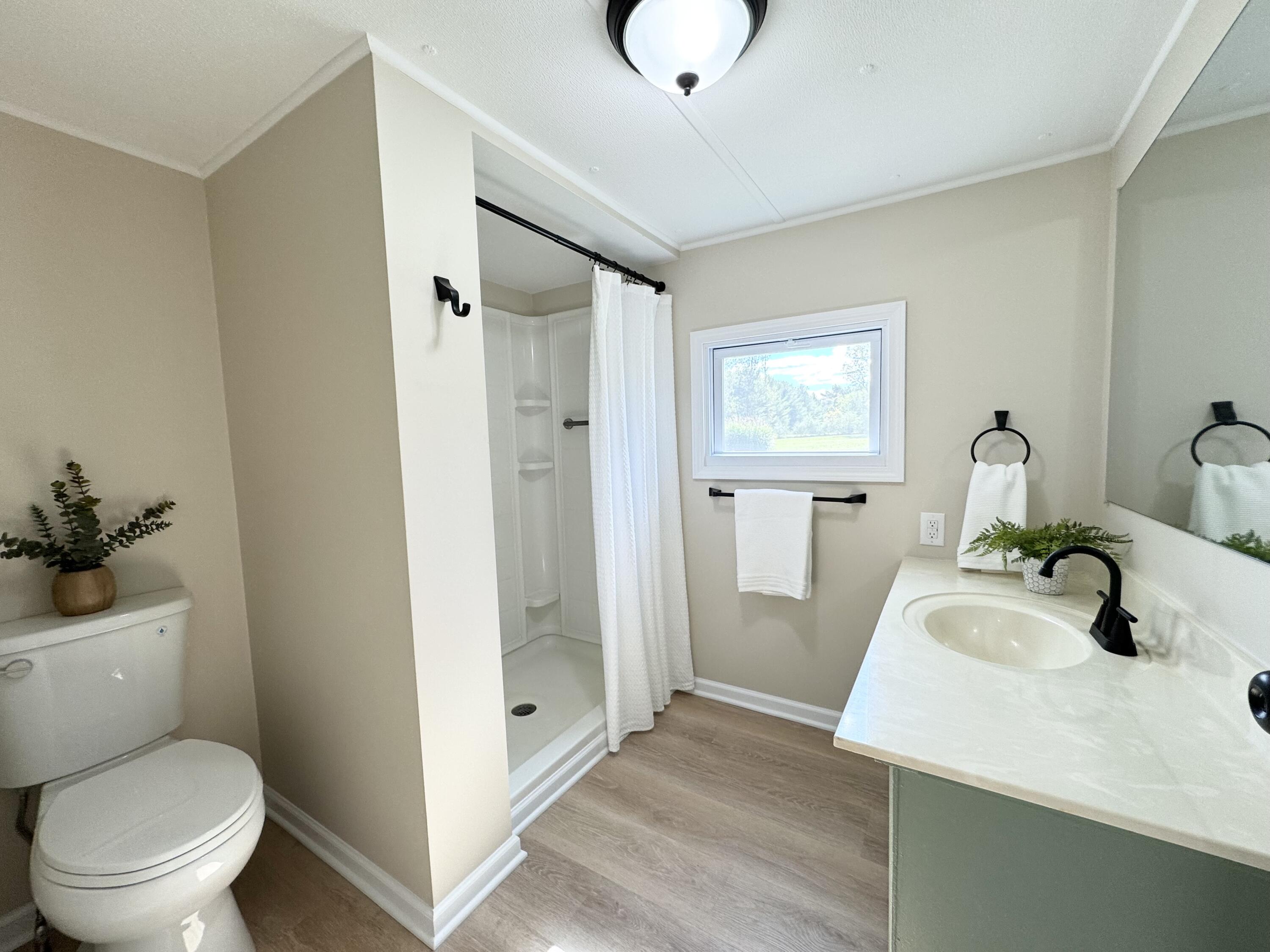 16303 Ritchie Avenue Northeast Sand Lake, MI 49343 - Photo 10 of 18 Bathroom