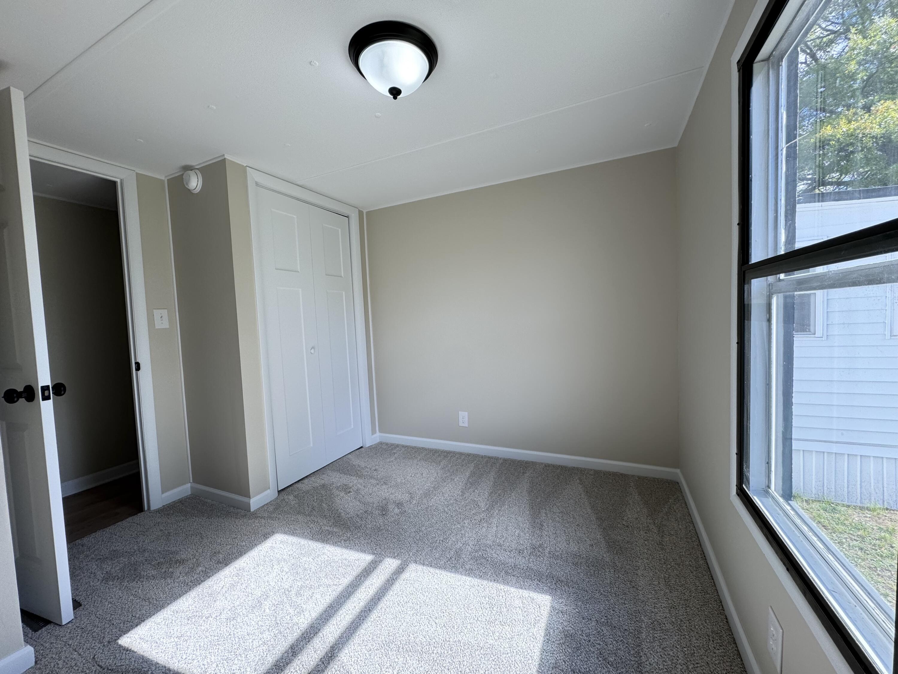 16303 Ritchie Avenue Northeast Sand Lake, MI 49343 - Photo 12 of 18 Bedroom