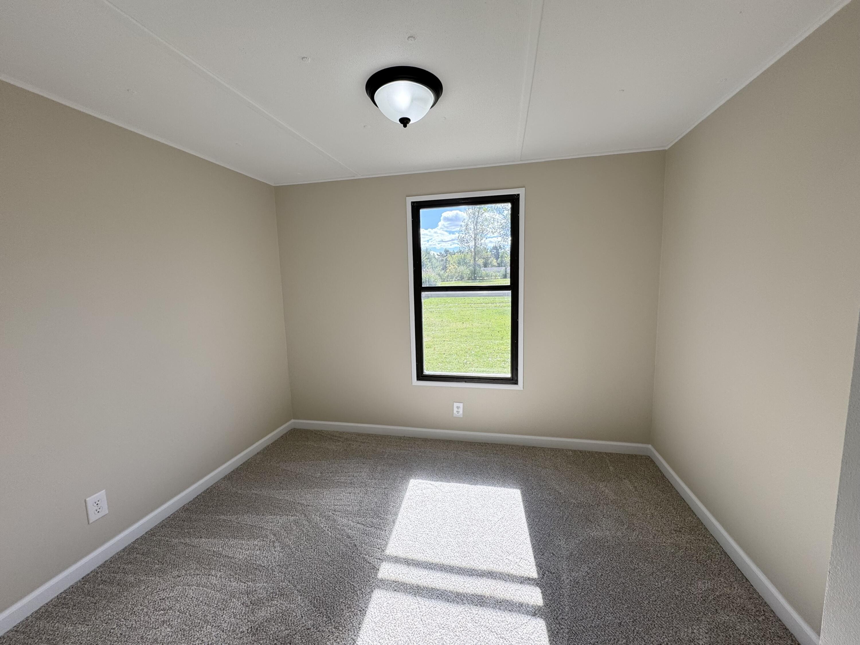 16303 Ritchie Avenue Northeast Sand Lake, MI 49343 - Photo 13 of 18 Bedroom