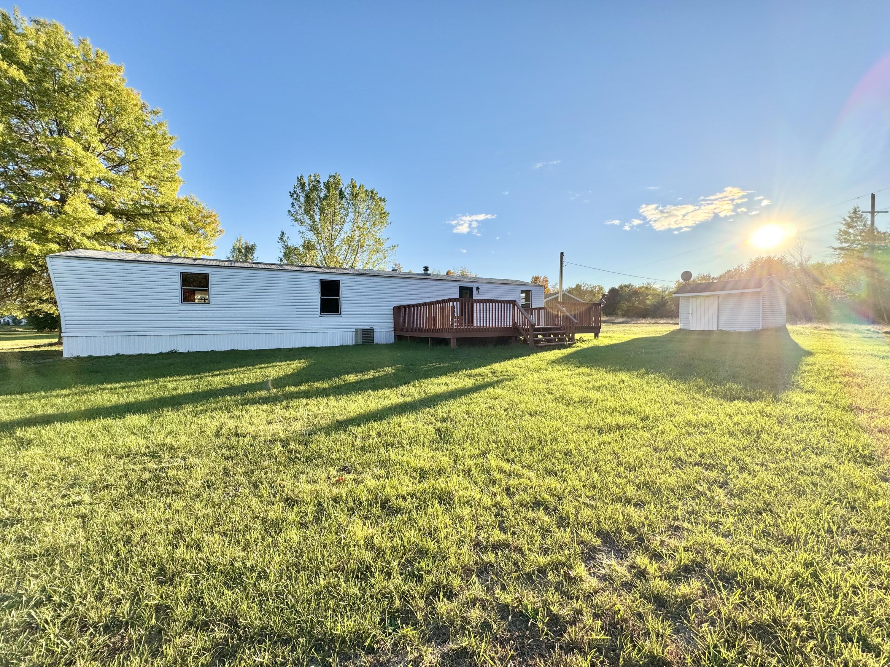 16303 Ritchie Avenue Northeast Sand Lake, MI 49343 - Photo 16 of 18 Back View