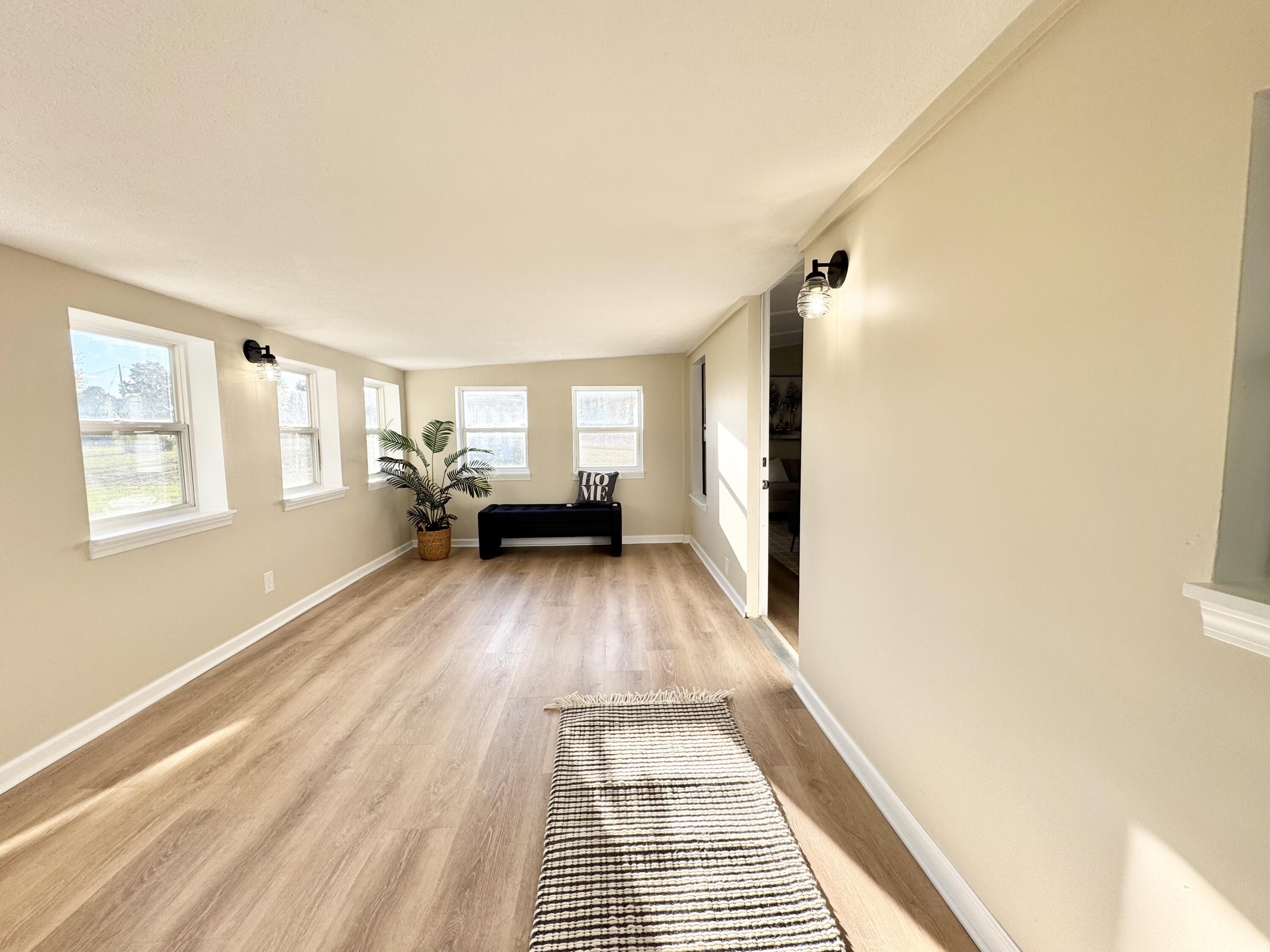 16303 Ritchie Avenue Northeast Sand Lake, MI 49343 - Photo 3 of 18 3 Seasons Porch