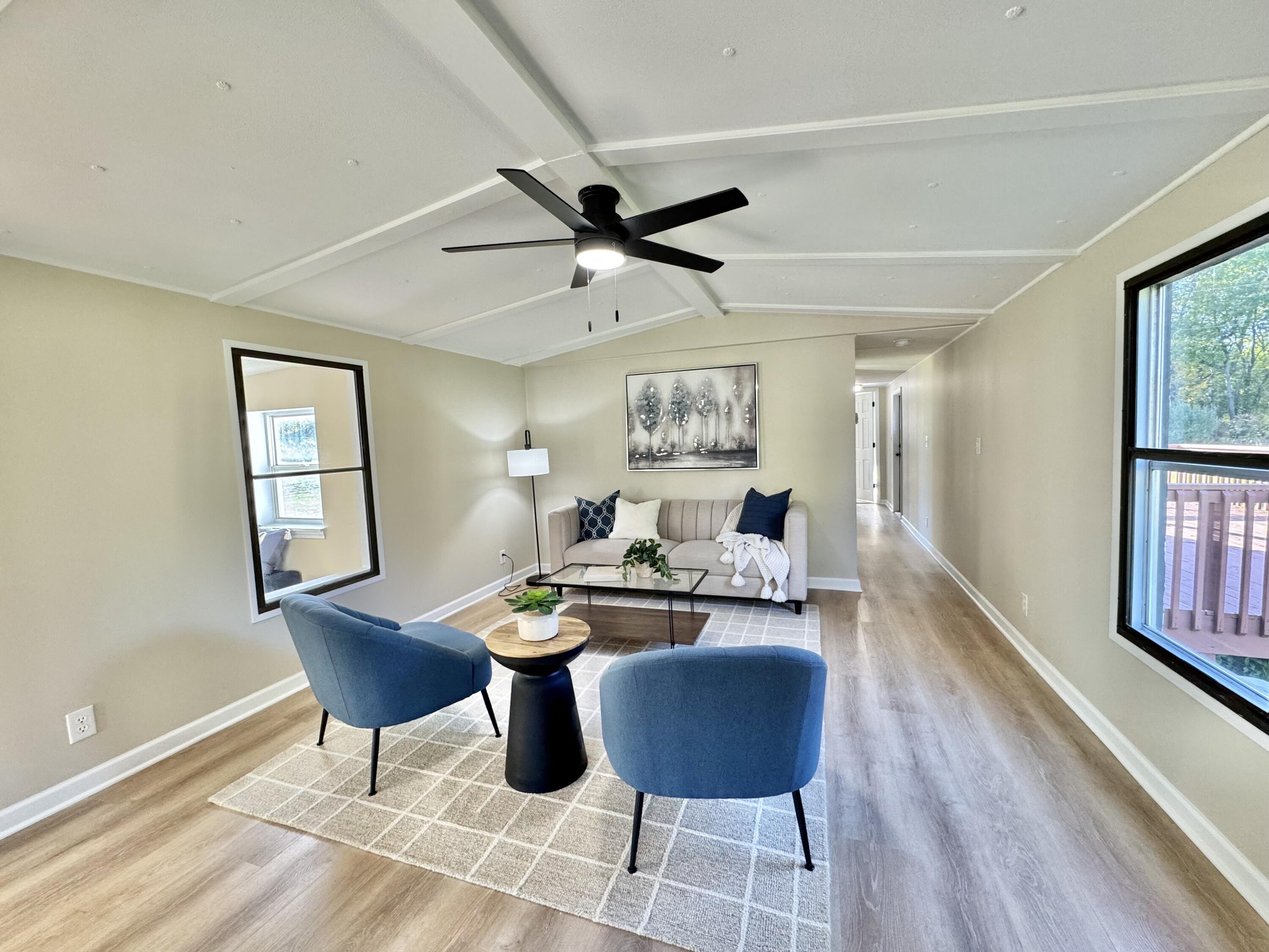 16303 Ritchie Avenue Northeast Sand Lake, MI 49343 - Photo 7 of 18 Living Room