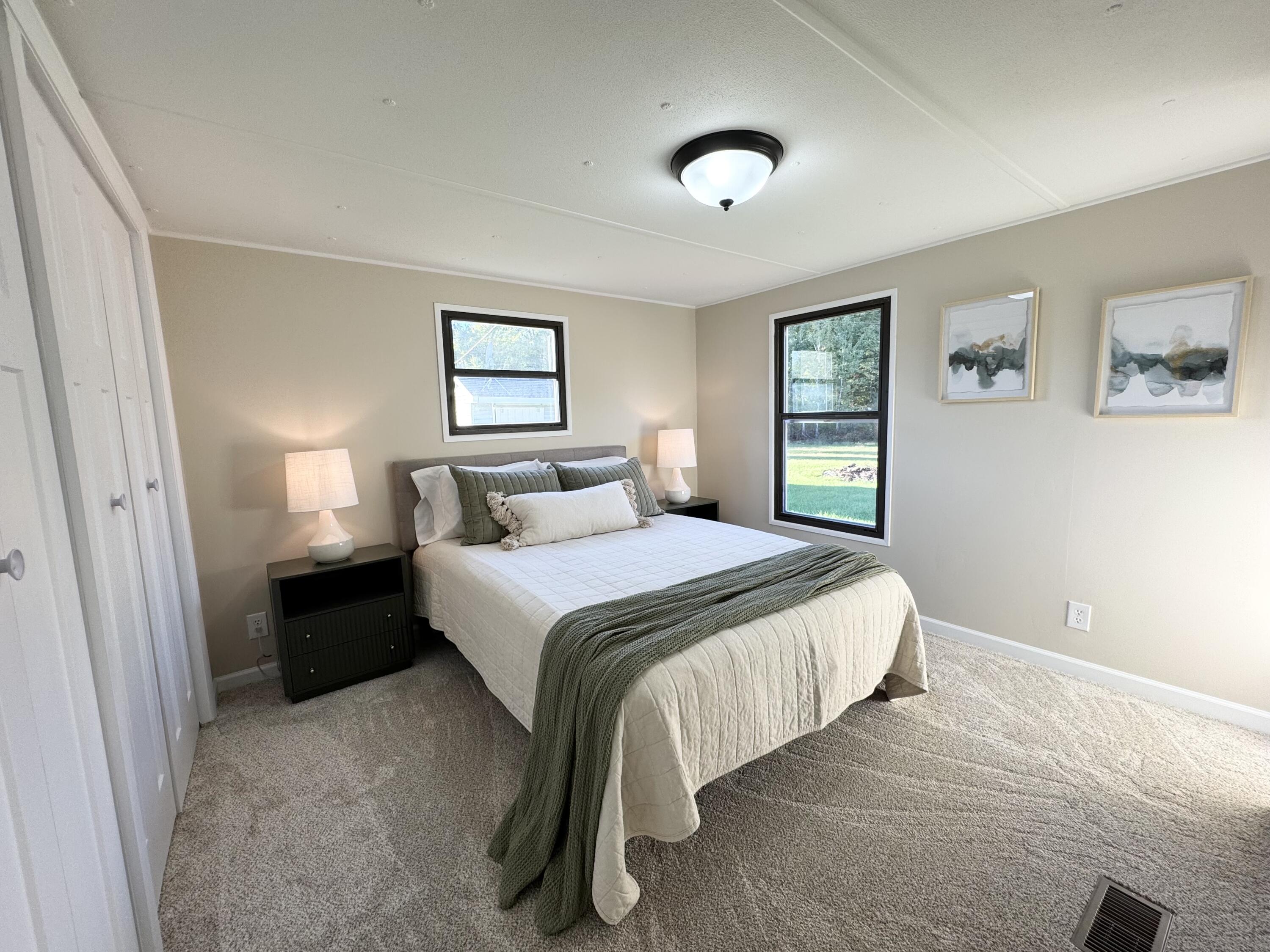 16303 Ritchie Avenue Northeast Sand Lake, MI 49343 - Photo 8 of 18 Primary Bedroom