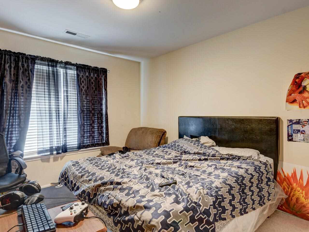 3536 Oneonta Avenue Raleigh, NC 27604 - Photo 16 of 22 a bedroom with a bed and a window