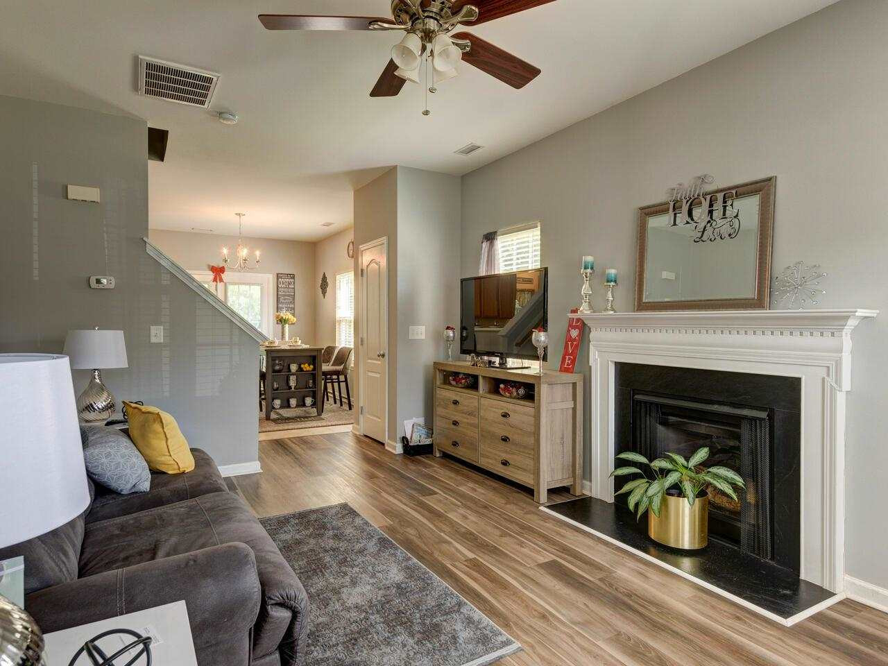 3536 Oneonta Avenue Raleigh, NC 27604 - Photo 3 of 22 a living room with furniture and a fireplace