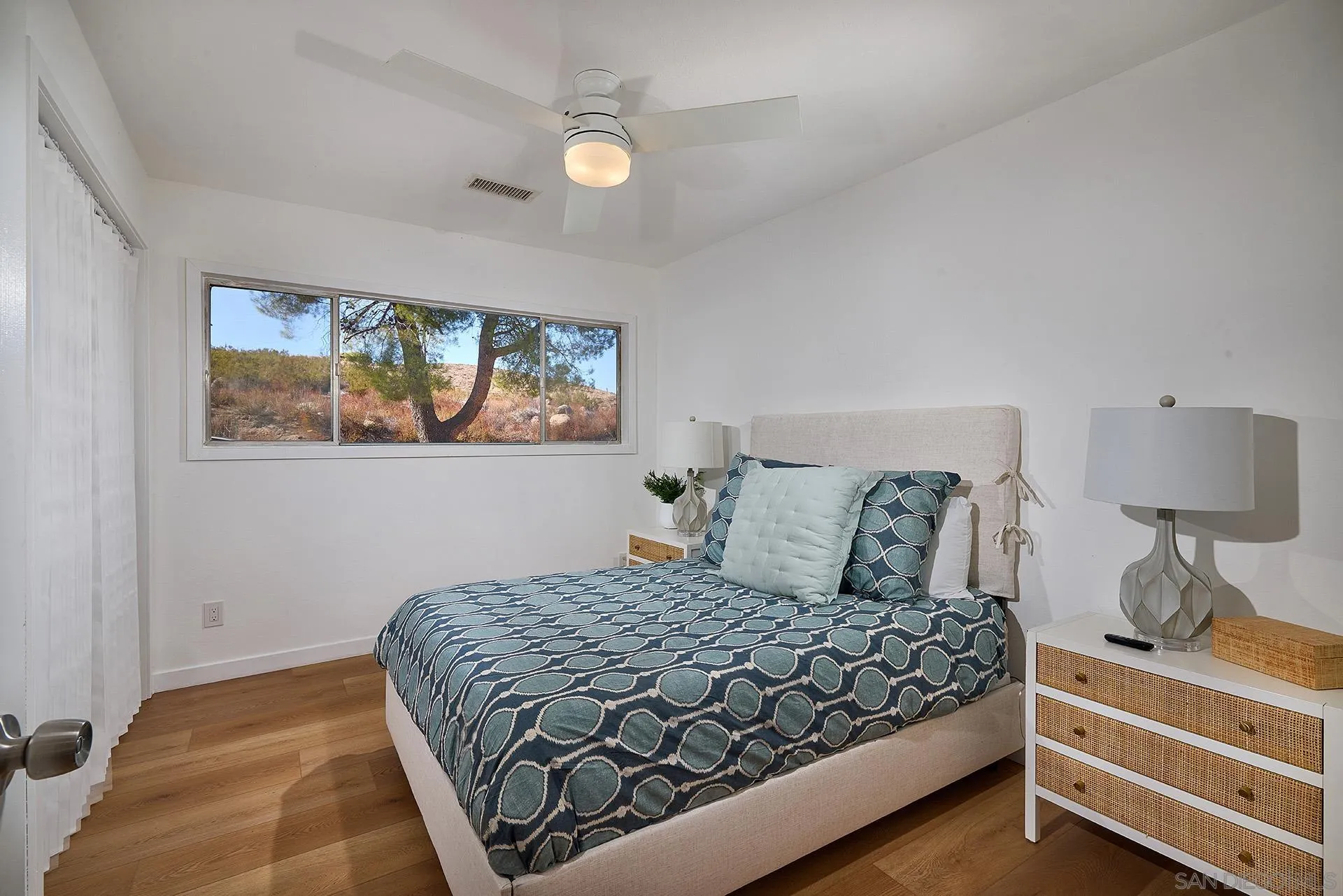 6185 Alpine Boulevard Alpine, CA 91901 - Photo 13 of 39 a bedroom with a bed and window
