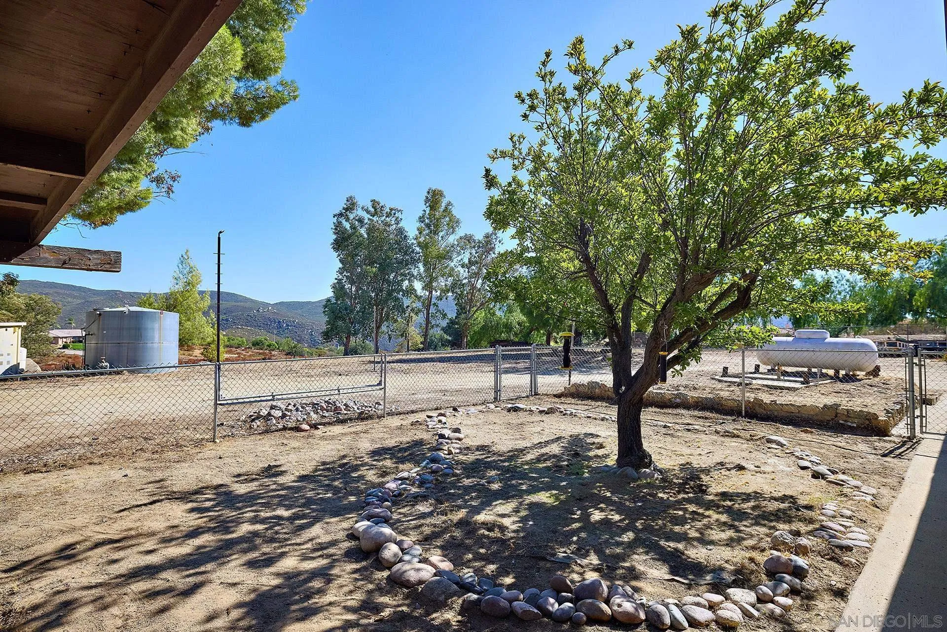 6185 Alpine Boulevard Alpine, CA 91901 - Photo 26 of 39 a view of a yard with a tree