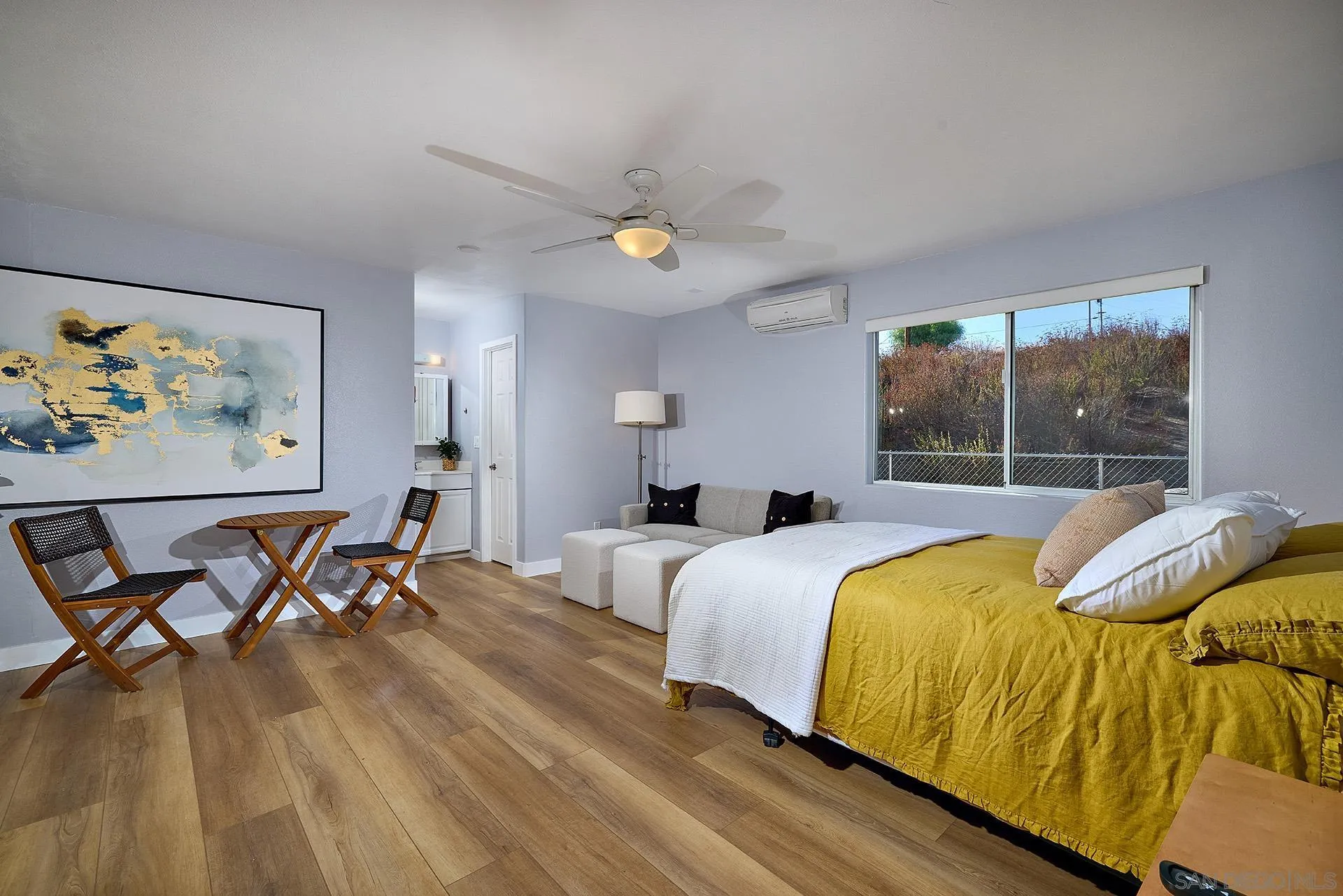 6185 Alpine Boulevard Alpine, CA 91901 - Photo 31 of 39 a bedroom with a bed and window