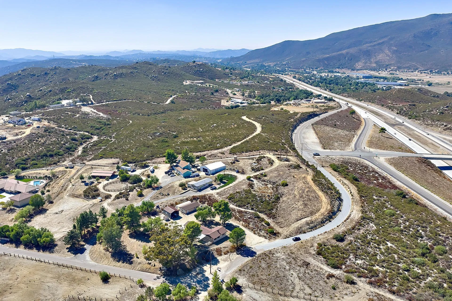 6185 Alpine Boulevard Alpine, CA 91901 - Photo 38 of 39 an aerial view of a house with a mountain