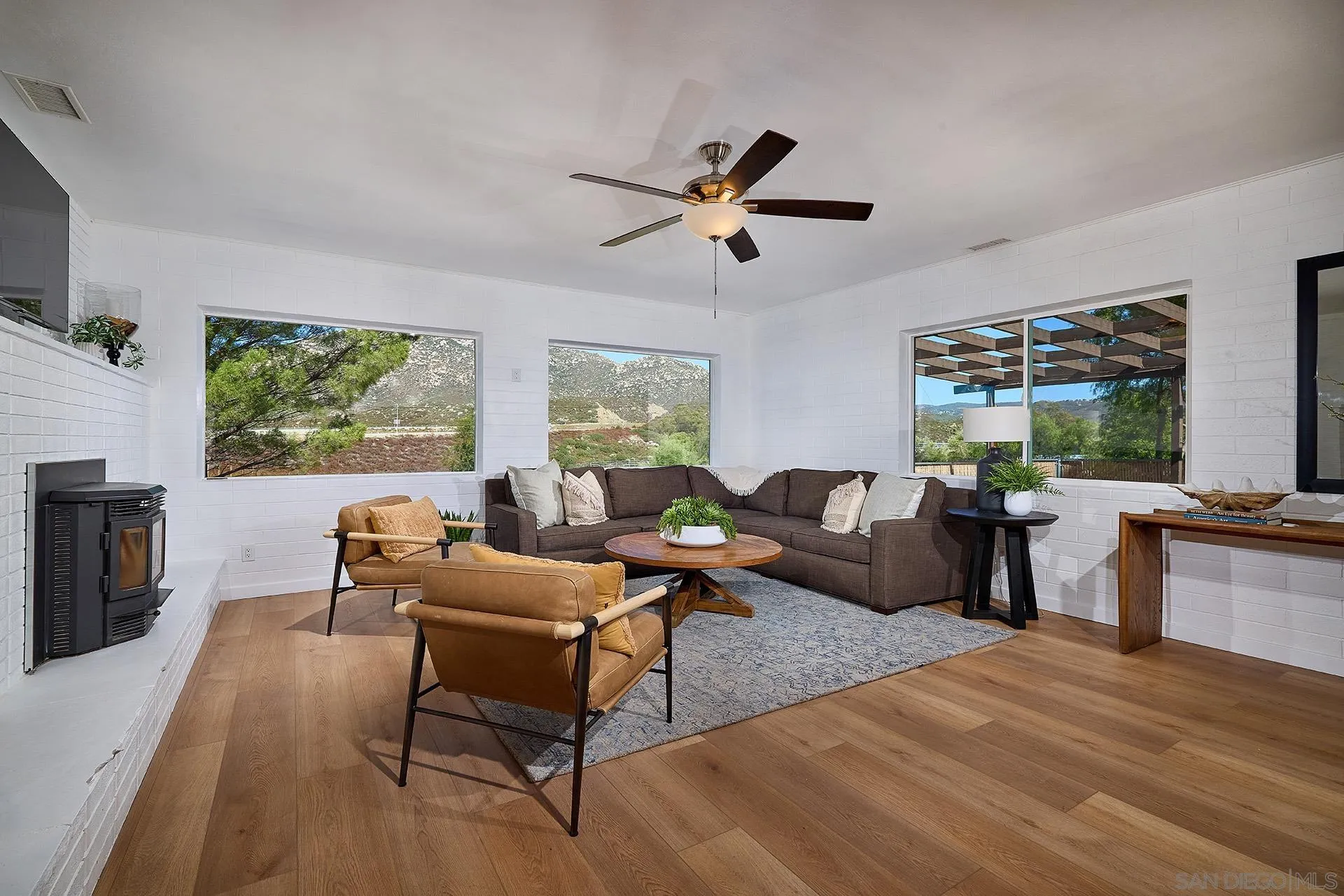 6185 Alpine Boulevard Alpine, CA 91901 - Photo 8 of 39 a living room with furniture and a large window