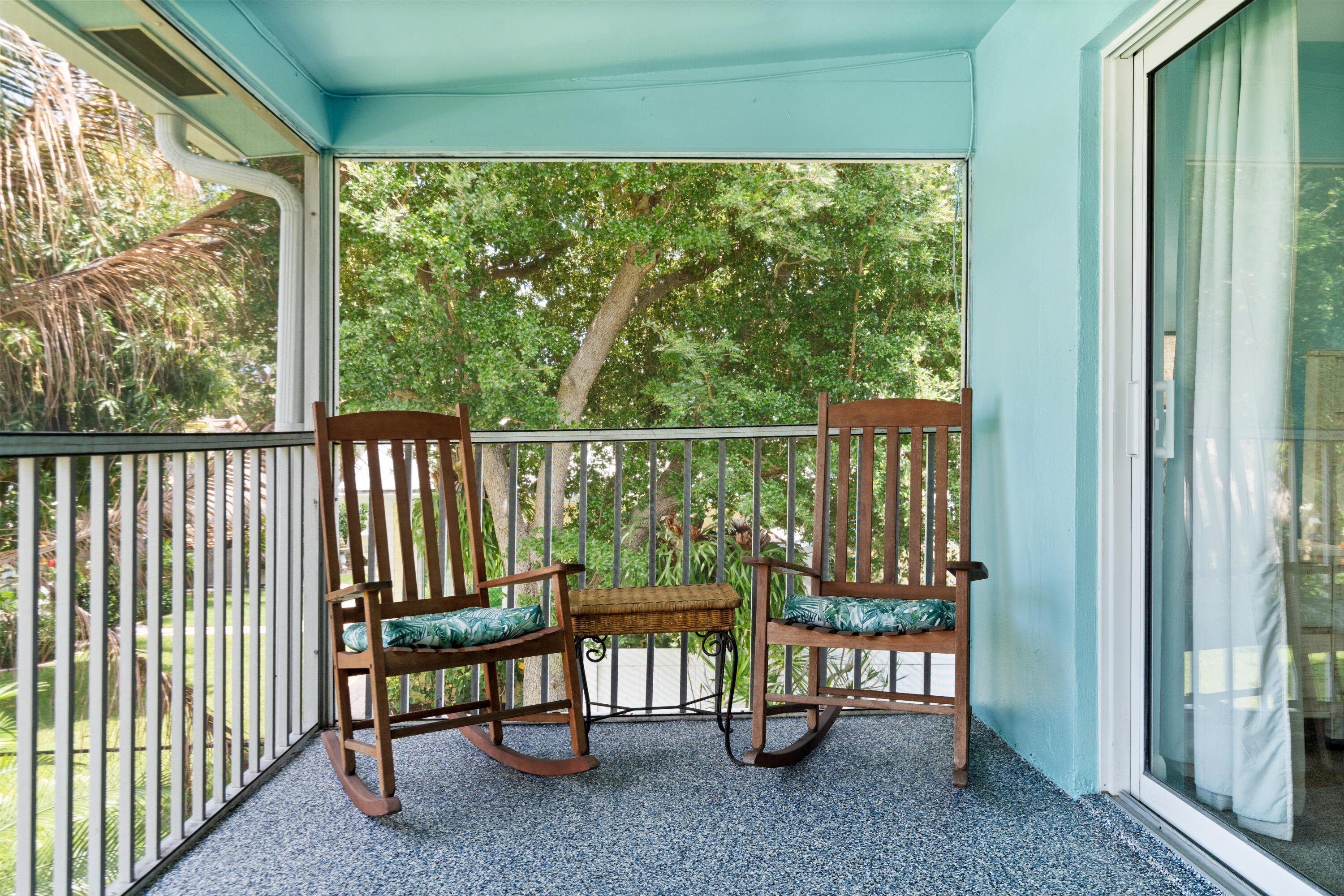 249 Center Street, Unit 2C Jupiter, FL 33458 - Photo 25 of 29 a view of two chairs in the balcony