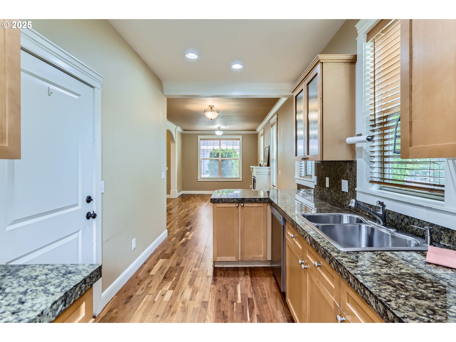 343 Northeast Bryant Street Portland, OR 97211 - Photo 12 of 26 a kitchen with granite countertop a sink and a stove