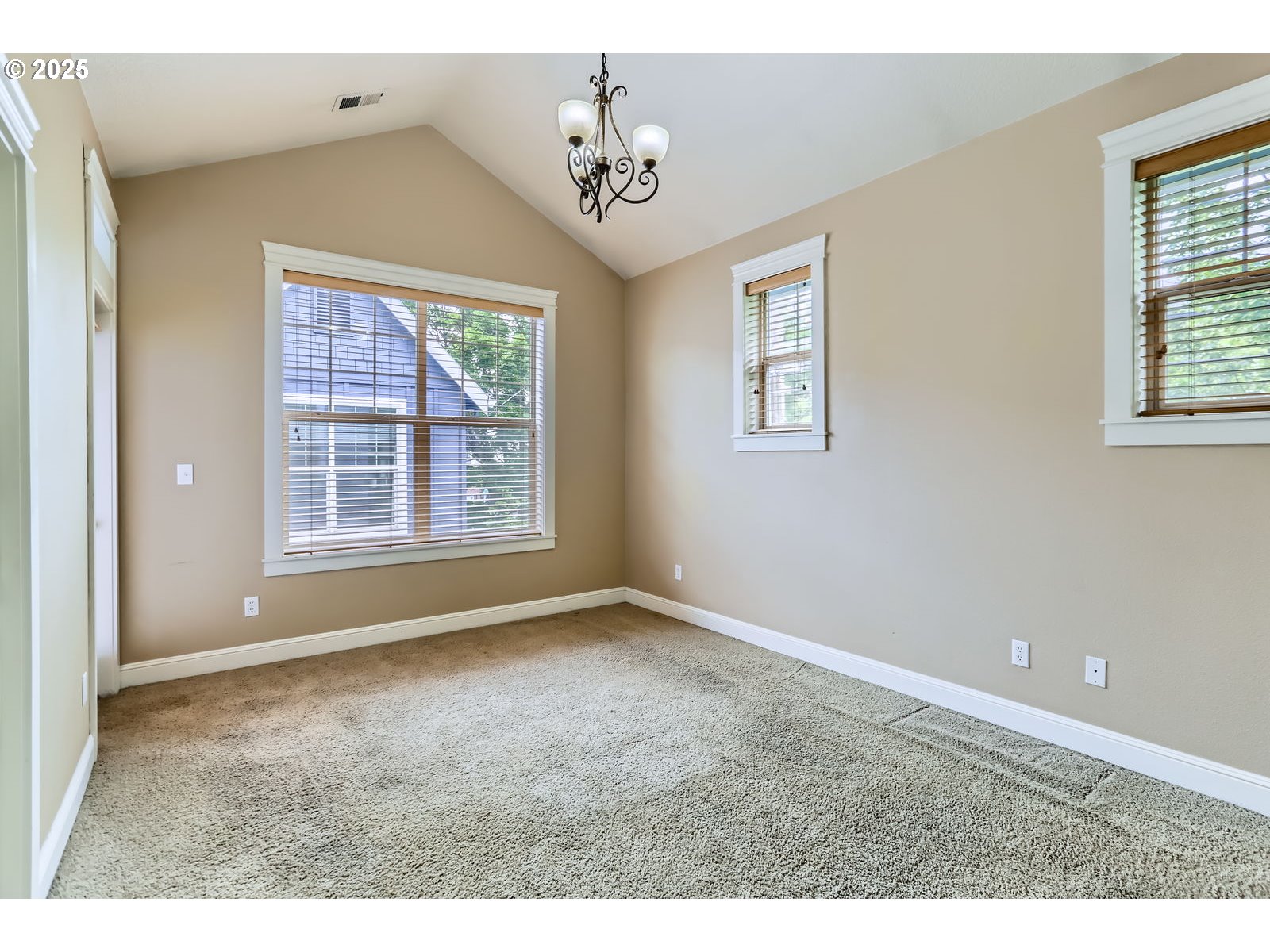 343 Northeast Bryant Street Portland, OR 97211 - Photo 14 of 26 a view of an empty room with a window