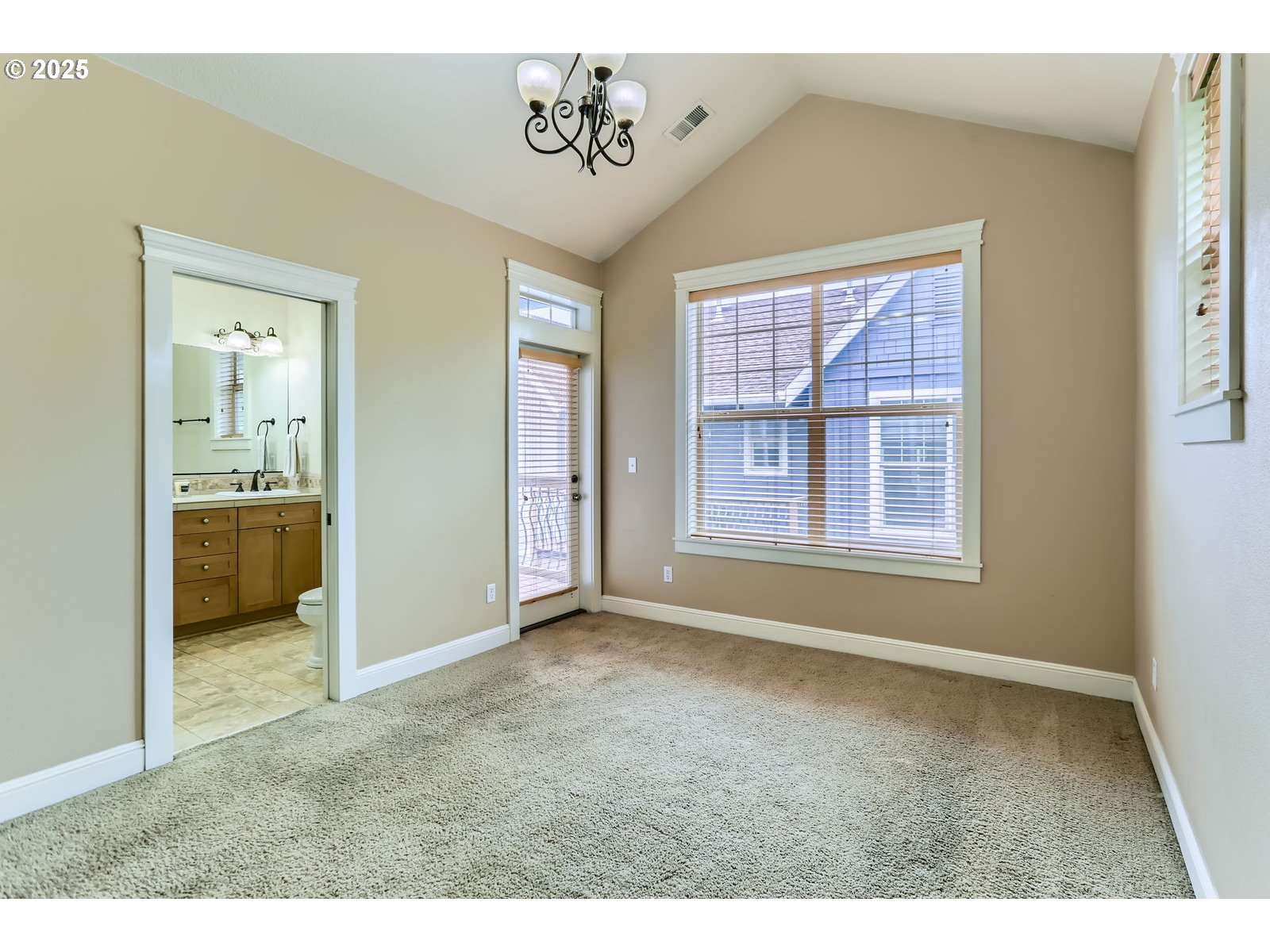343 Northeast Bryant Street Portland, OR 97211 - Photo 15 of 26 a view of an empty room with a window