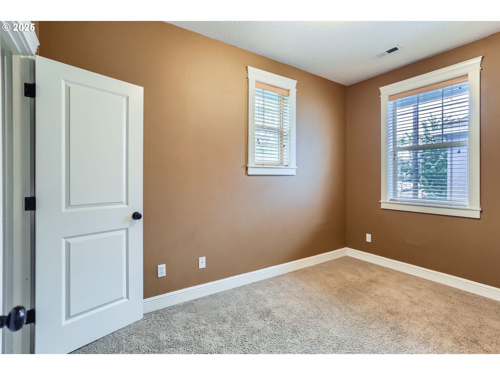 343 Northeast Bryant Street Portland, OR 97211 - Photo 19 of 26 a view of an empty room with a window