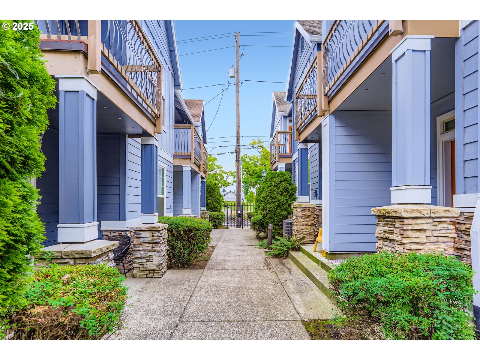343 Northeast Bryant Street Portland, OR 97211 - Photo 2 of 26 a view of a pathway along the building