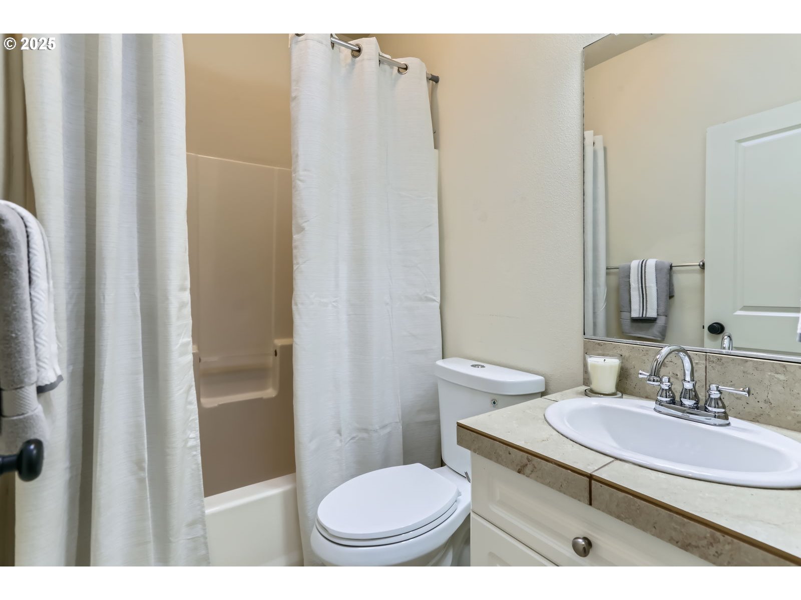 343 Northeast Bryant Street Portland, OR 97211 - Photo 21 of 26 a bathroom with a sink toilet and shower