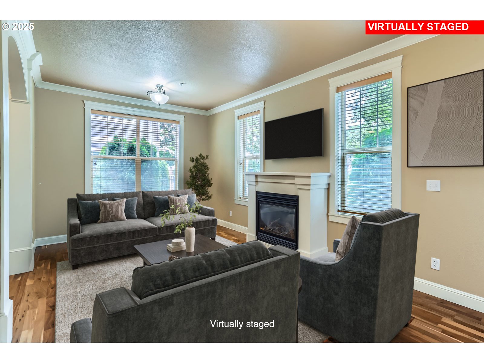 343 Northeast Bryant Street Portland, OR 97211 - Photo 25 of 26 a living room with furniture a fireplace and a flat screen tv